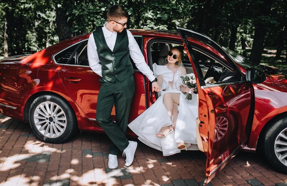 A,Stylish,Groom,In,A,Suit,And,A,Beautiful,Bride