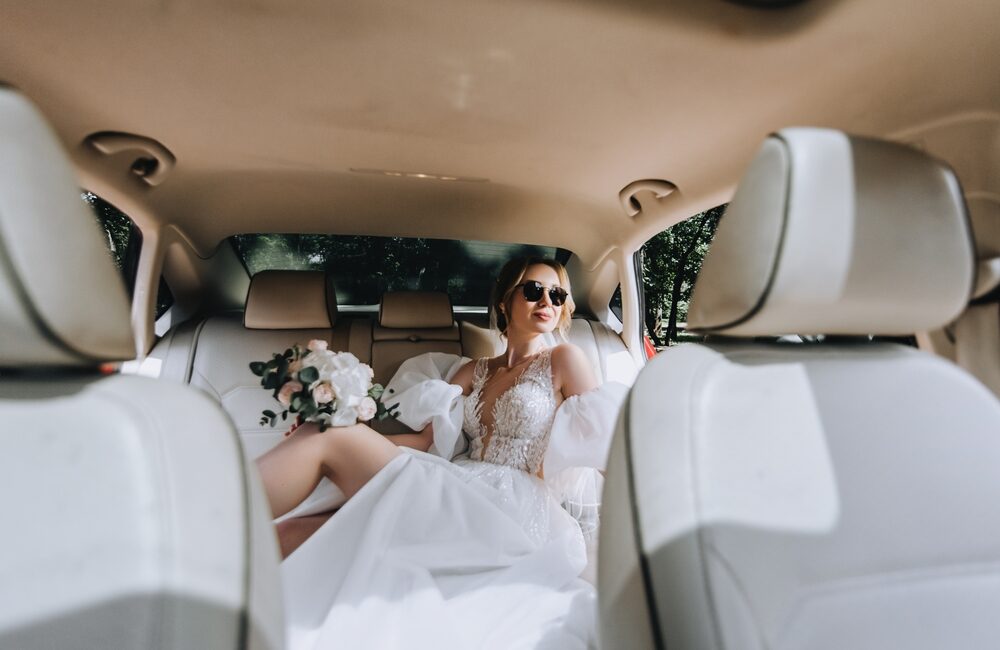 A,Beautiful,Smiling,Young,Blonde,Bride,With,A,Bouquet,In
