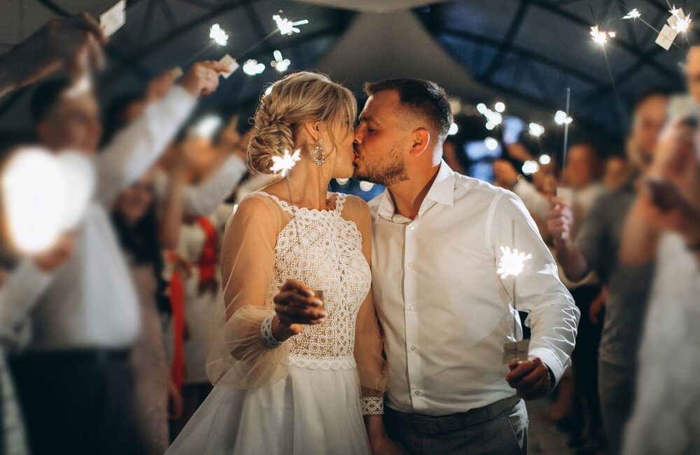 Wedding,Couple,Bride,And,Groom,Walking,Down,The,Corridor,With